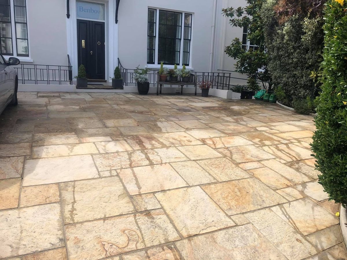 Natural stone patio and driveway after pressure washing